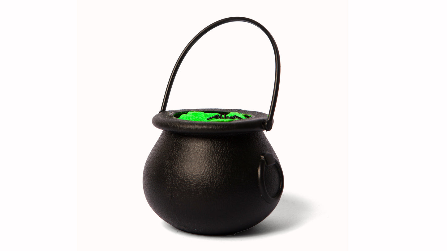 Green halloween bath bomb or bath fizzer with spider toy from top