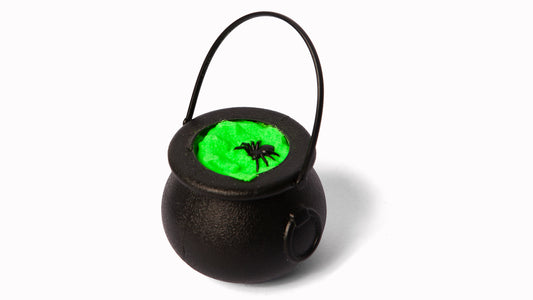 Green halloween bath bomb or bath fizzer with spider toy from top