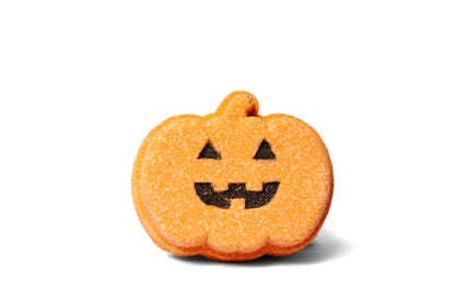Pumpkin-shaped Jack 'o Lantern bath bomb or bath fizzer from the front.